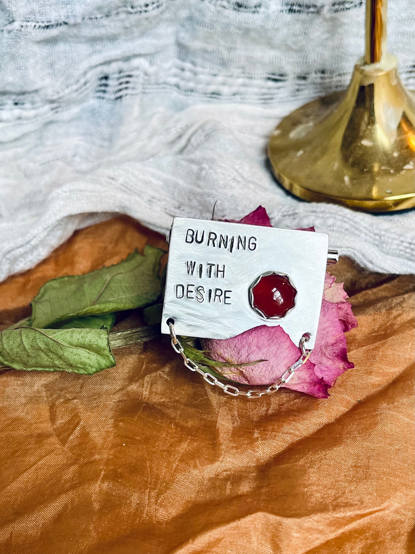 burning with desire brooch