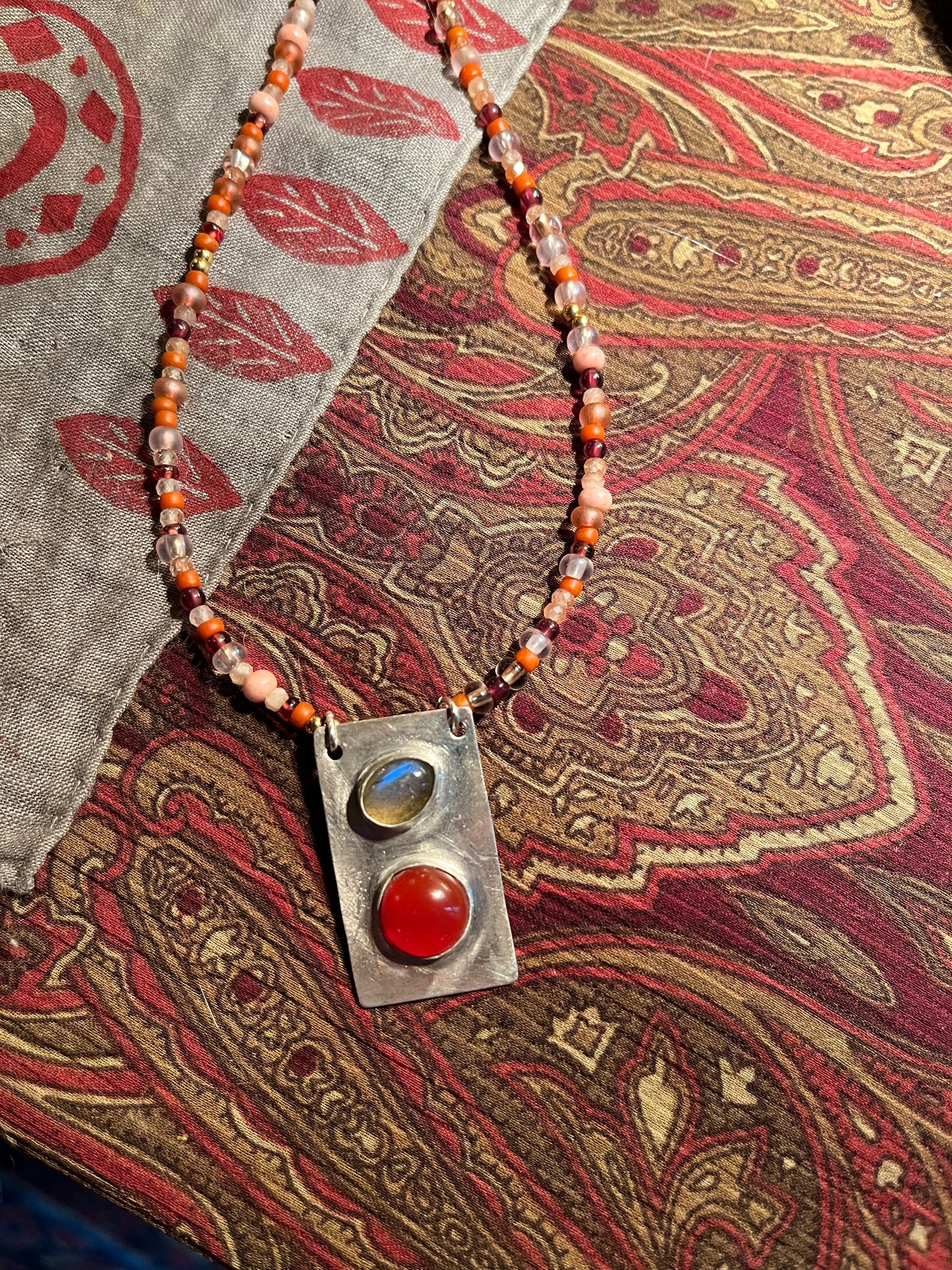 labradorite and carnelian pendant with mixed gemstone and bead necklace strand